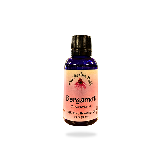 Bergamot essential oil bottle with a pink label on a white background