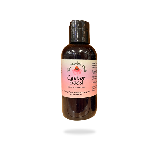 Bottle of Castor Seed oil with a label on a white background.