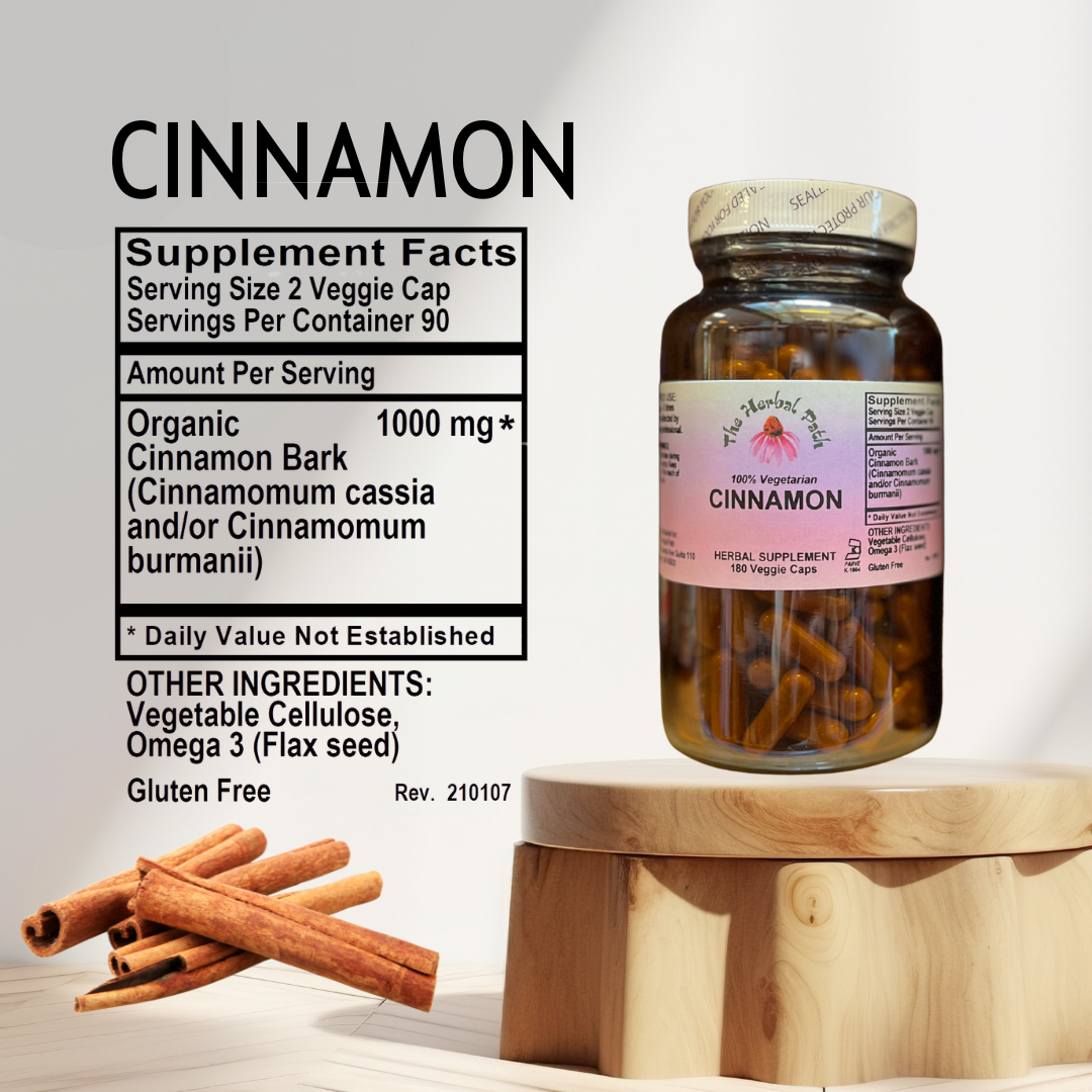 Supplement bottle labeled 'Cinnamon' with cinnamon sticks on a wooden surface.