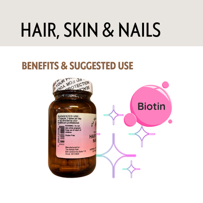 Vitamin supplement bottle with biotin label on a light gray background