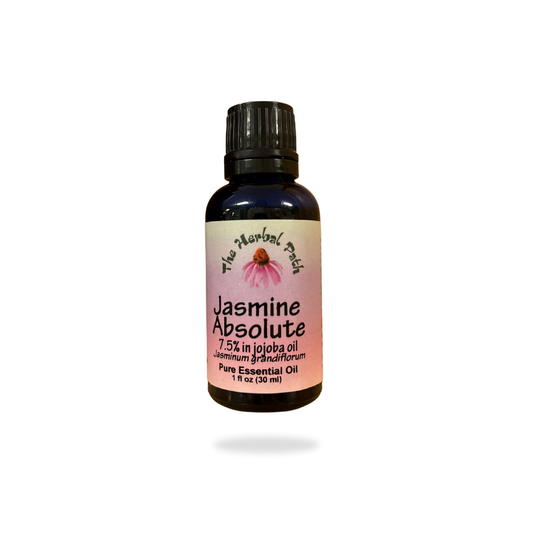 Bottle of Jasmine Absolute essential oil with a pink label on a white background