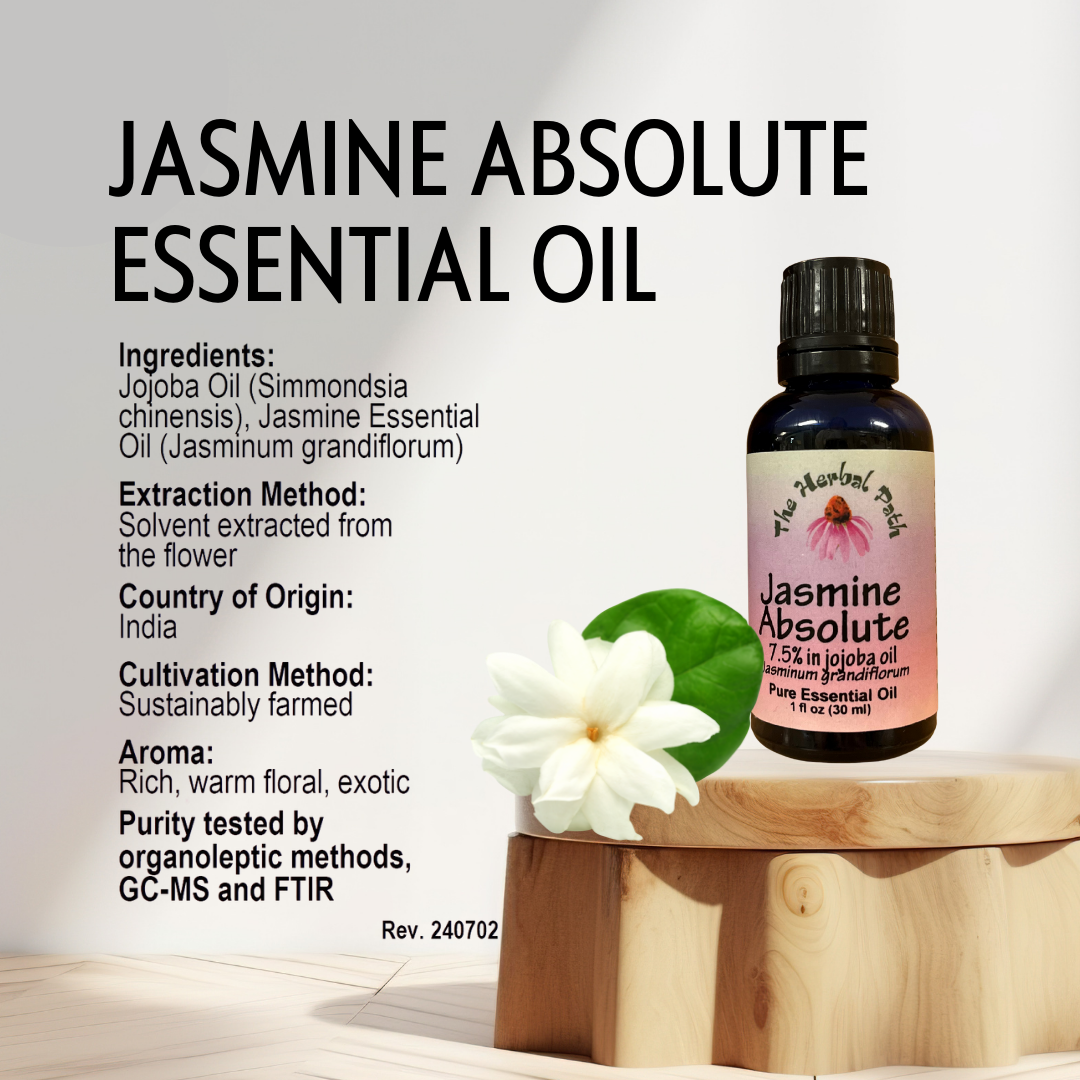 Jasmine Absolute essential oil bottle with jasmine flower on a wooden block against a light background