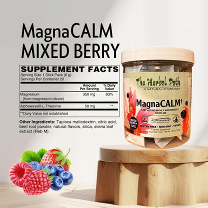 MagnaCALM Mixed Berry supplement jar with ingredients and label on a wooden stand.