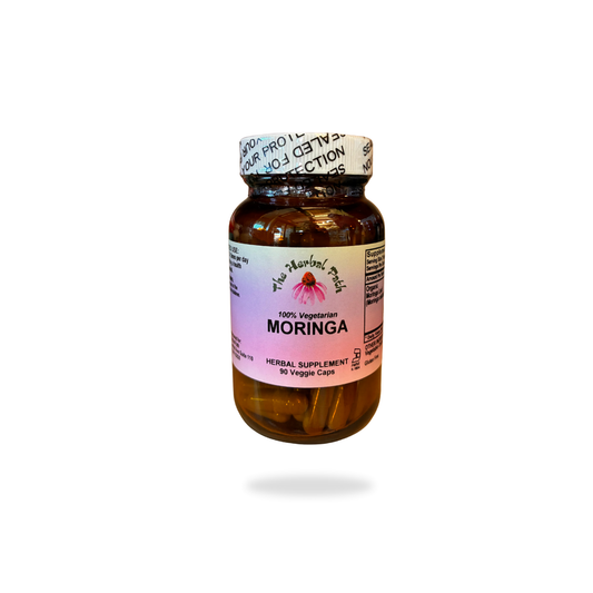 Bottle of Moringa supplement on a white background