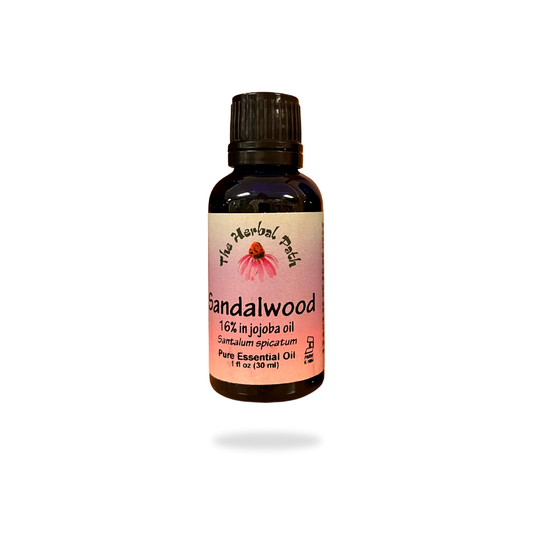 Sandalwood essential oil bottle with label on a white background