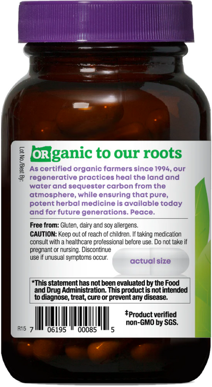An amber glass supplement bottle with a purple cap and a white product label reading 'Organic to our roots' on a plain white background.