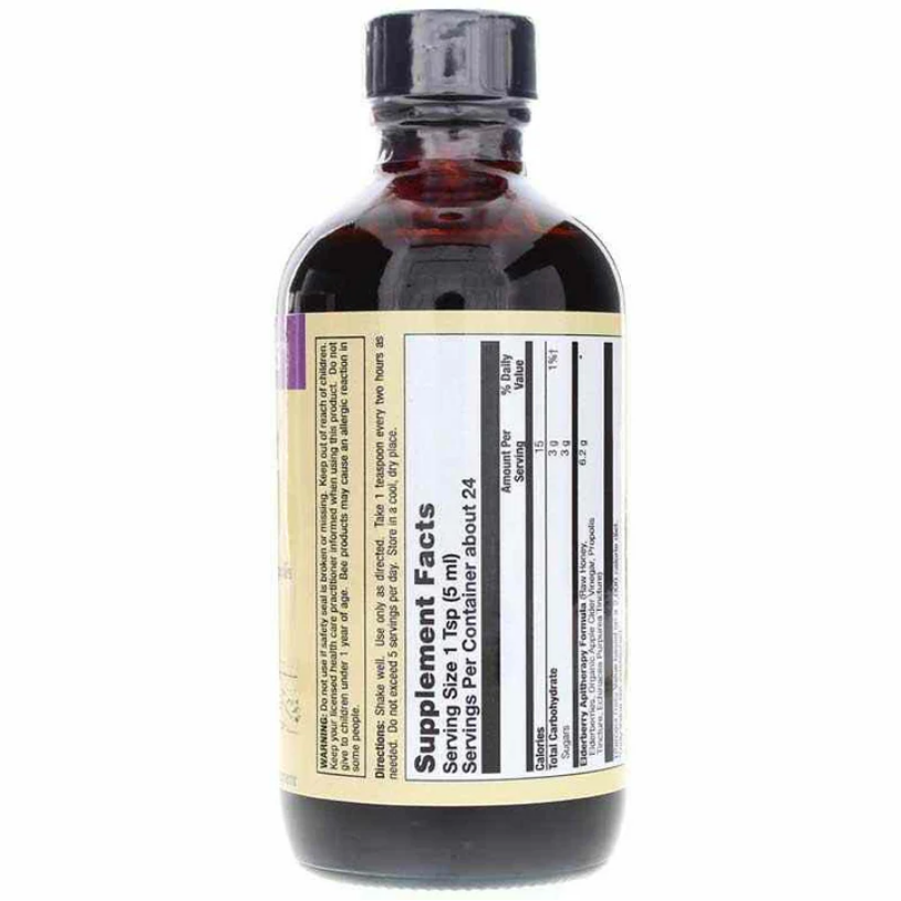 An amber glass bottle with a black cap and a cream-colored supplement facts label, shown against a plain white background.