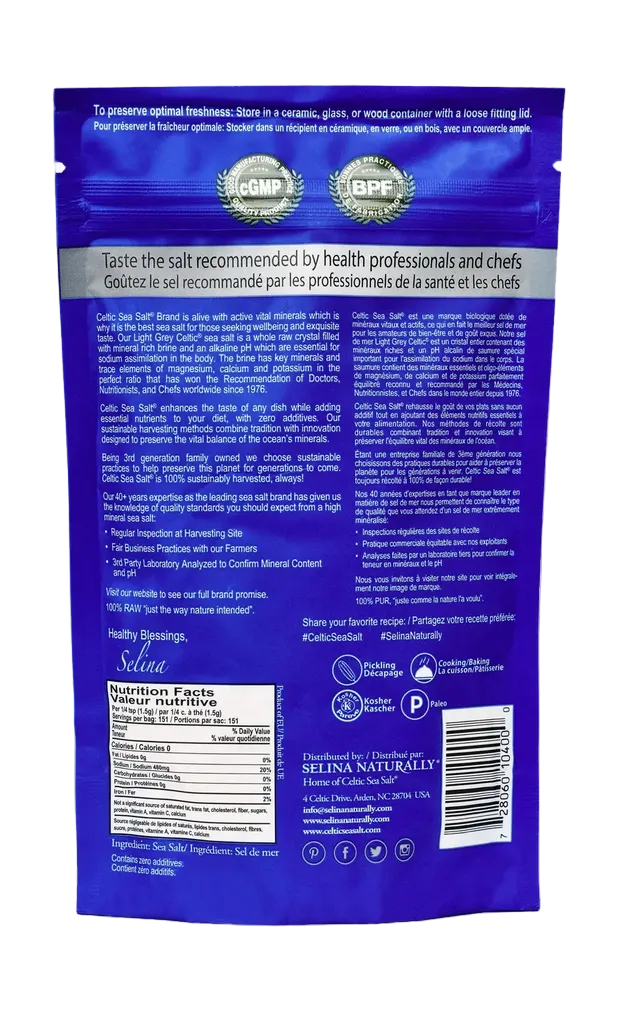 The back of a blue resealable pouch of Selina Naturally Sea Salt, showing product details, ingredients, nutrition facts, and a barcode on a light textured background.