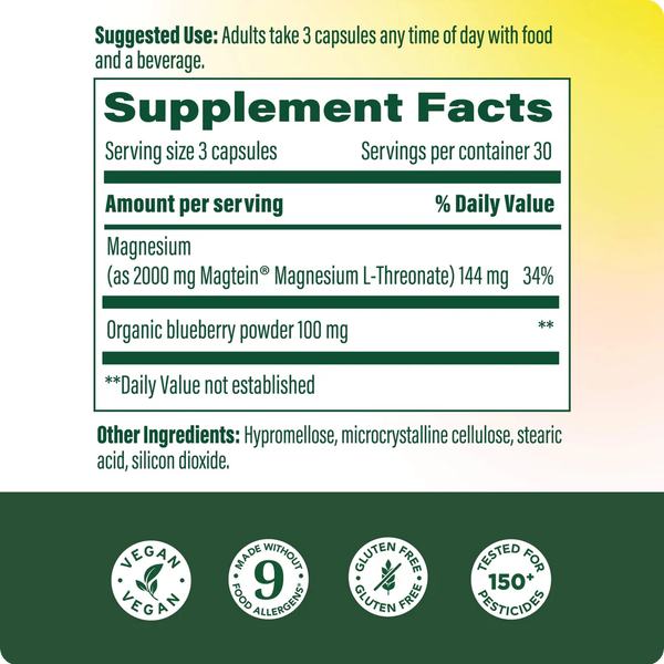 A supplement facts label panel with text about serving size, magnesium, organic blueberry powder, and other ingredients, plus circular badges at the bottom reading vegan, gluten free, and tested for pesticides.