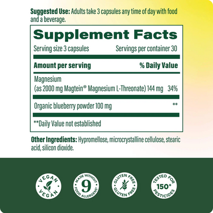 A supplement facts label panel with text about serving size, magnesium, organic blueberry powder, and other ingredients, plus circular badges at the bottom reading vegan, gluten free, and tested for pesticides.