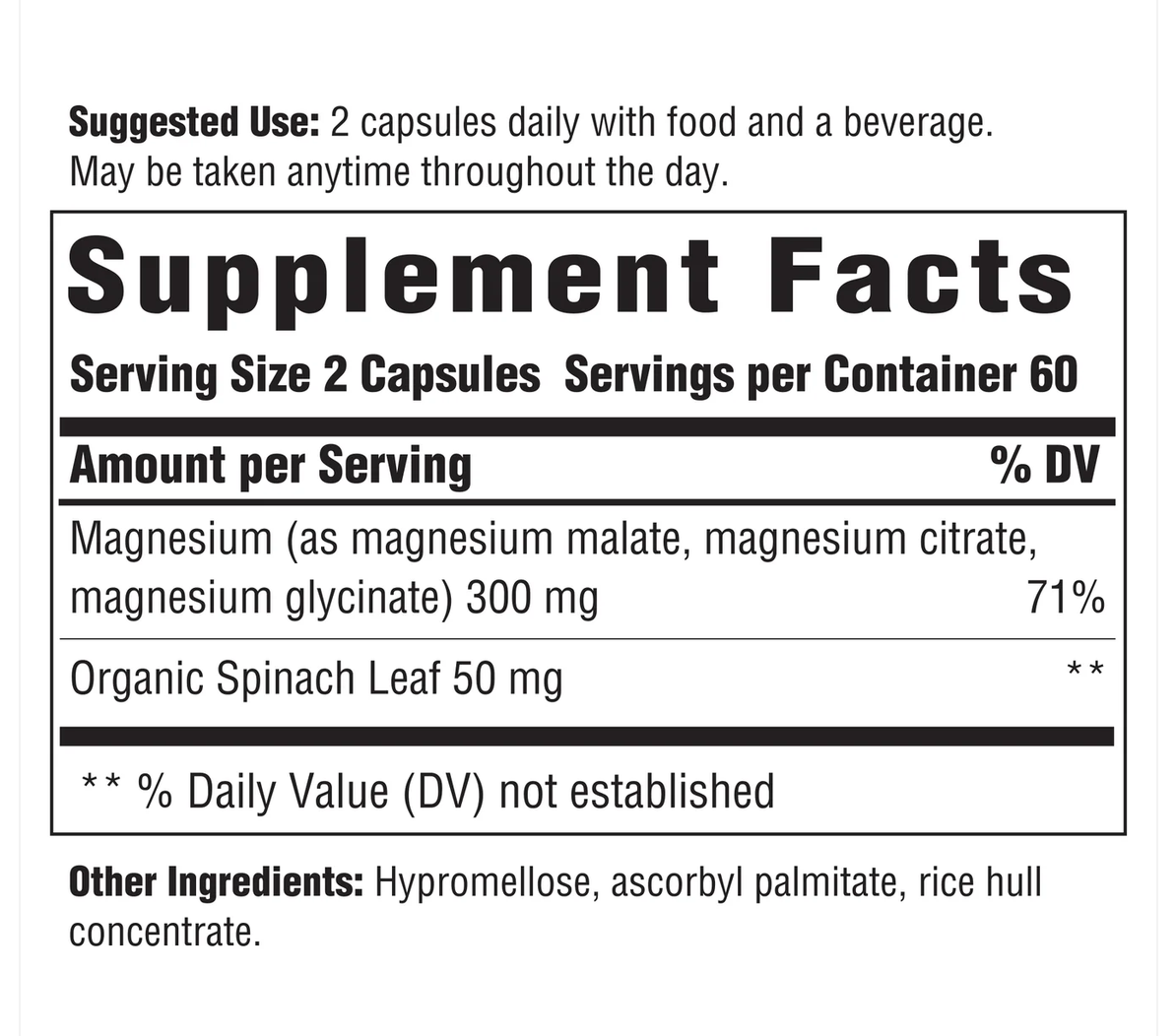 A close-up of a supplement facts label showing suggested use, serving size 2 capsules, and ingredient details for magnesium and organic spinach leaf.