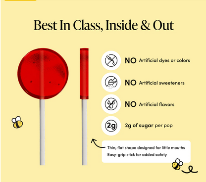 Promotional infographic for a red lollipop stick on a pale yellow background, showing the round lollipop, the stick with red top, icons stating no artificial dyes/sweeteners/flavors, 2g sugar per pop, and thin flat shape designed for little mouths.