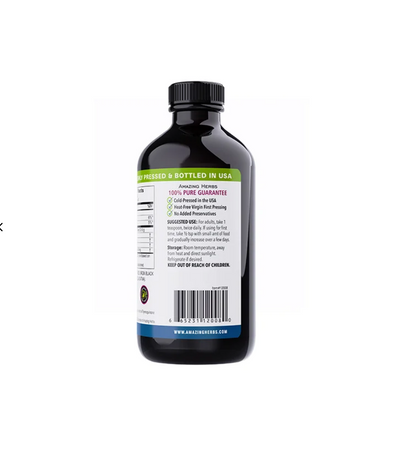 Black bottle with a label on a white background