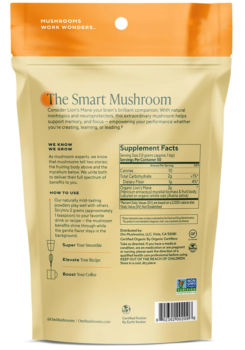 Back view of a kraft paper bag of OnMyMushrooms 'The Smart Mushroom' supplement. The packaging features a warm orange top band and a light tan body with black text detailing product information, a supplement facts panel, and usage instructions.
