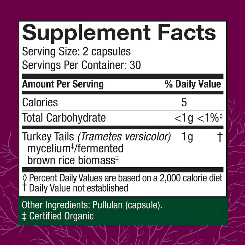 A supplement facts label reading 'Turkey Tails (Trametes versicolor)' with serving size 2 capsules, on a dark purple background with subtle branch-like line art.