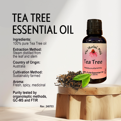 Tea tree essential oil bottle with label on a wooden block, featuring product details.