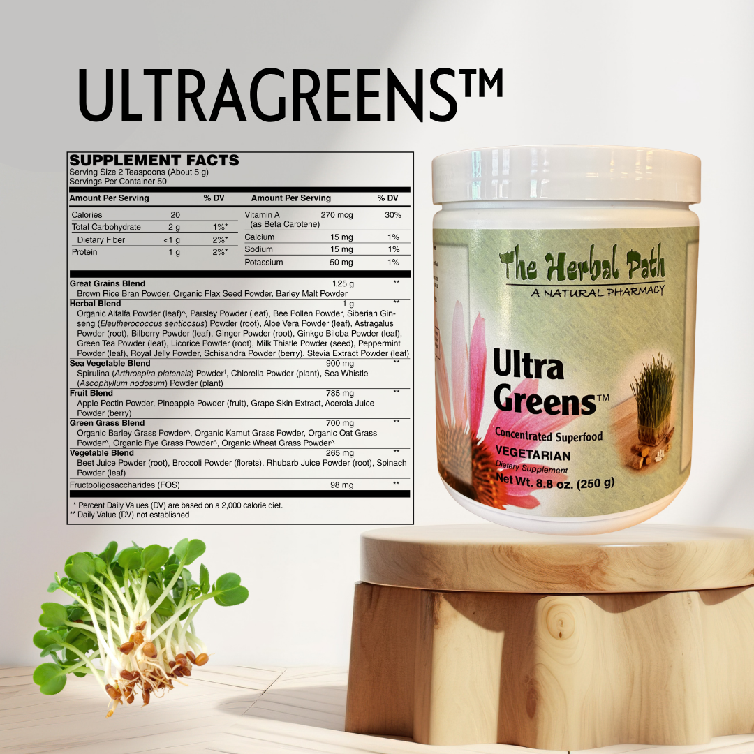 Ultra Greens supplement container with label and green herbs on a wooden surface
