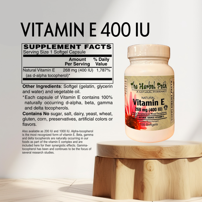 Vitamin E 400 IU supplement bottle with label on a wooden stand against a light background.