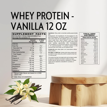 Whey protein powder package information for Vanilla 12 oz, showing the Supplement Facts panel, full ingredients list, and typical amino acid profile on a light wood background with vanilla flowers and beans.